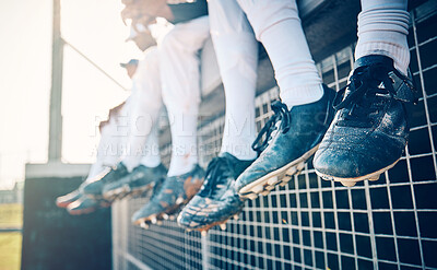 Buy stock photo Baseball feet, team and sport field stadium for fitness, workout and game exercise. Softball shoes, sports group and summer outdoor with people sitting on an athlete training break together 