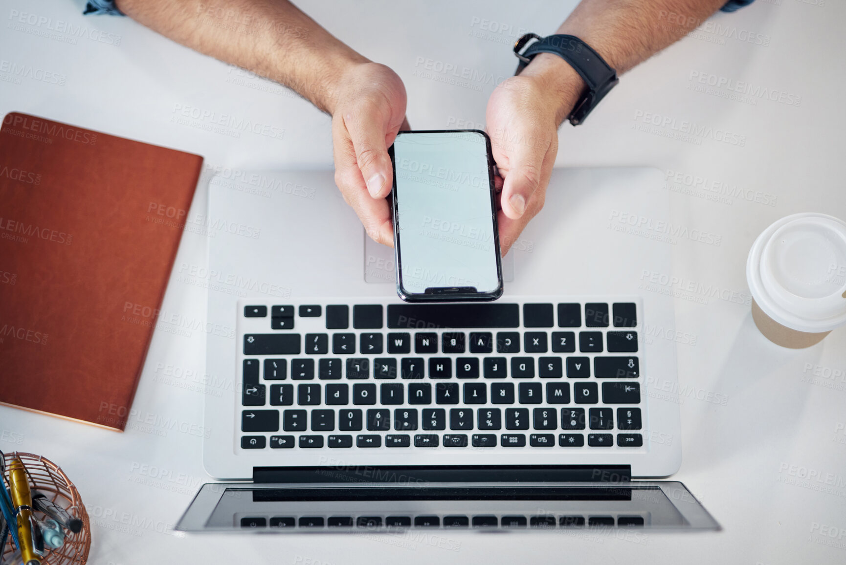 Buy stock photo Above, phone screen and laptop by hands of man with mockup for advertising and space. Smartphone, display and business influencer online for blog, financial and advice, freelance and remote work