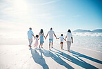 Travel, beach and big family walking on vacation together at the sea or ocean bonding for love and happiness. Happy, sun and parents with children or kids and grandparents on holiday for freedom