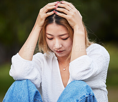 Buy stock photo Sad, depression and a woman in a park with a mistake, thinking and anxiety. Tired, idea and a girl or person in a garden or field with fear, anger or depressed about a problem, fail or memory