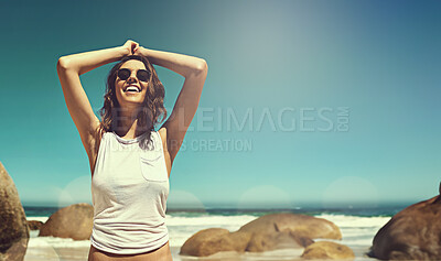 Buy stock photo Smile, travel and woman at beach on summer vacation, adventure or holiday with freedom in Mexico. Happy, sunglasses and young female person by ocean, sea and blue sky with mockup on weekend trip.