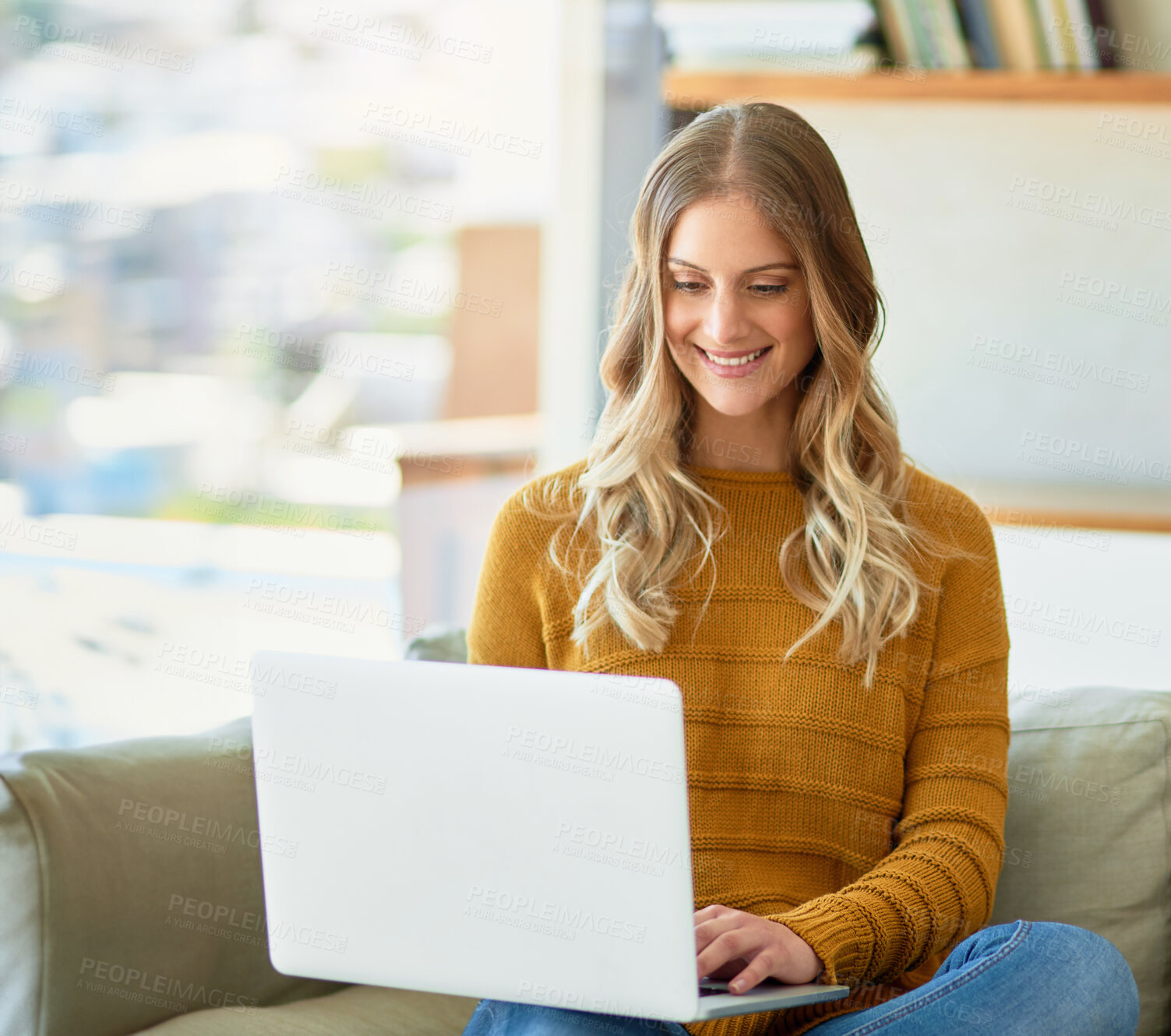 Buy stock photo Woman, work from home and laptop with smile, typing and lounge for deadline as freelancer or copywriter. Female person, journalist and technology for article, story or newsletter as creative for job