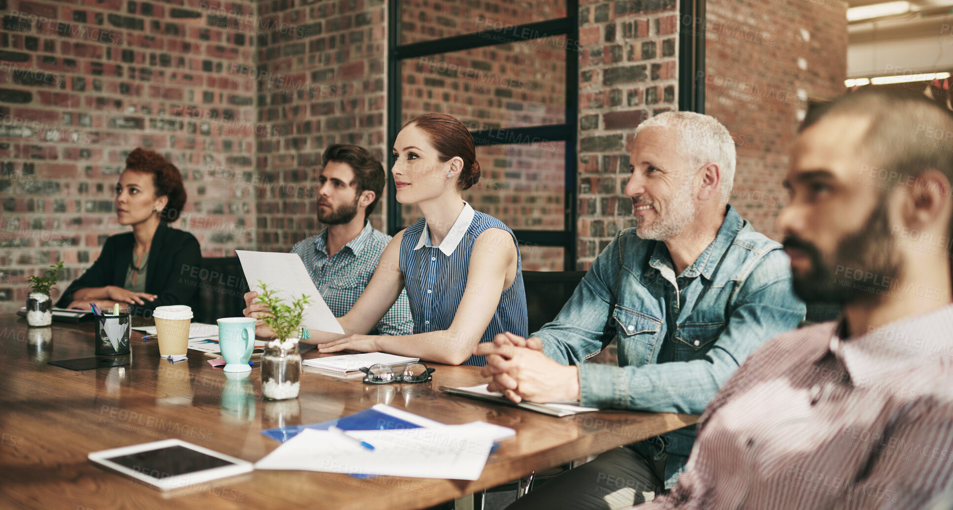 Buy stock photo Discussion, group and colleagues in meeting, office and collaboration for research and media strategist. Teamwork, creative and report of target market, documents and people in boardroom and planning