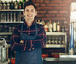 Man, portrait and smile with confidence, restaurant and small business startup for pizzeria. Chef, entrepreneur and arms crossed for bistro, food and service industry owner in New York cafe in apron