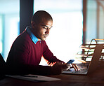 Night, typing and businessman with phone, laptop or research for online project at startup. Reading, internet search and consultant at desk with smartphone, computer and checking email in dark office