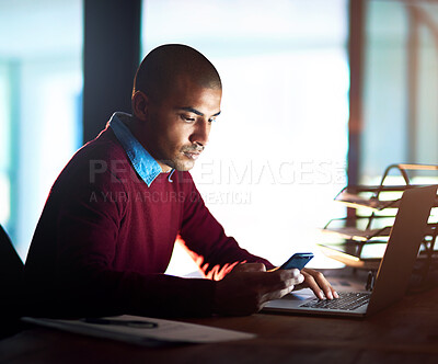 Buy stock photo Night, typing and businessman with phone, laptop or research for online project at startup. Reading, internet search and consultant at desk with smartphone, computer and checking email in dark office