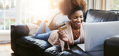 Buy stock photo Credit card, laptop and black woman on sofa in home for online shopping, internet purchase and payment. Ecommerce, fintech and happy person on computer for budget website, sales and digital banking