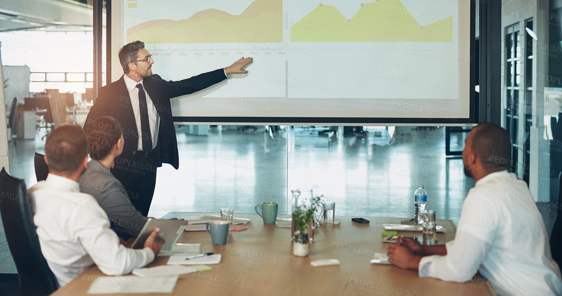 Buy stock photo Businessman, presentation and meeting or graphs statistics in boardroom with financial analysis, charts or report. Colleagues, office and review for company productivity or workshop, sales or growth