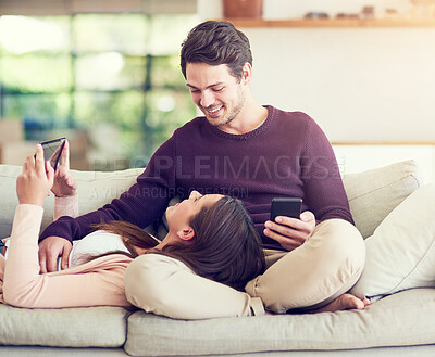 Buy stock photo Smile, couple and relax on sofa with technology for social media, movie or streaming video together. Tablet, man and woman in living room for online shopping or reading blog on mobile app in home