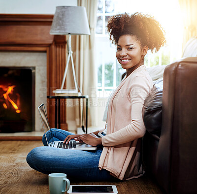 Buy stock photo Home, portrait and black woman on floor, laptop and typing with lens flare, website info and email notification. African person, copywriting or freelancer with computer, tech or internet with smile