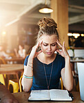 Book, stress and girl with headache at cafe for learning with vertigo, disaster or brain fog at campus cafeteria. University, anxiety or student frustrated by notebook fail, overthinking or deadline
