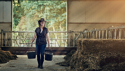 Buy stock photo Farm, woman and work with bucket in barn for agriculture, sustainability or maintenance at countryside. Farmer, smile and happy with container in shed for eco friendly, rural career or ranch in Texas