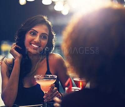 Buy stock photo Relax, women and friends with cocktails, nightclub and happiness at party, social gathering and celebration. People, lights and girls with drinks, mocktails and alcohol with smile, cheerful and event