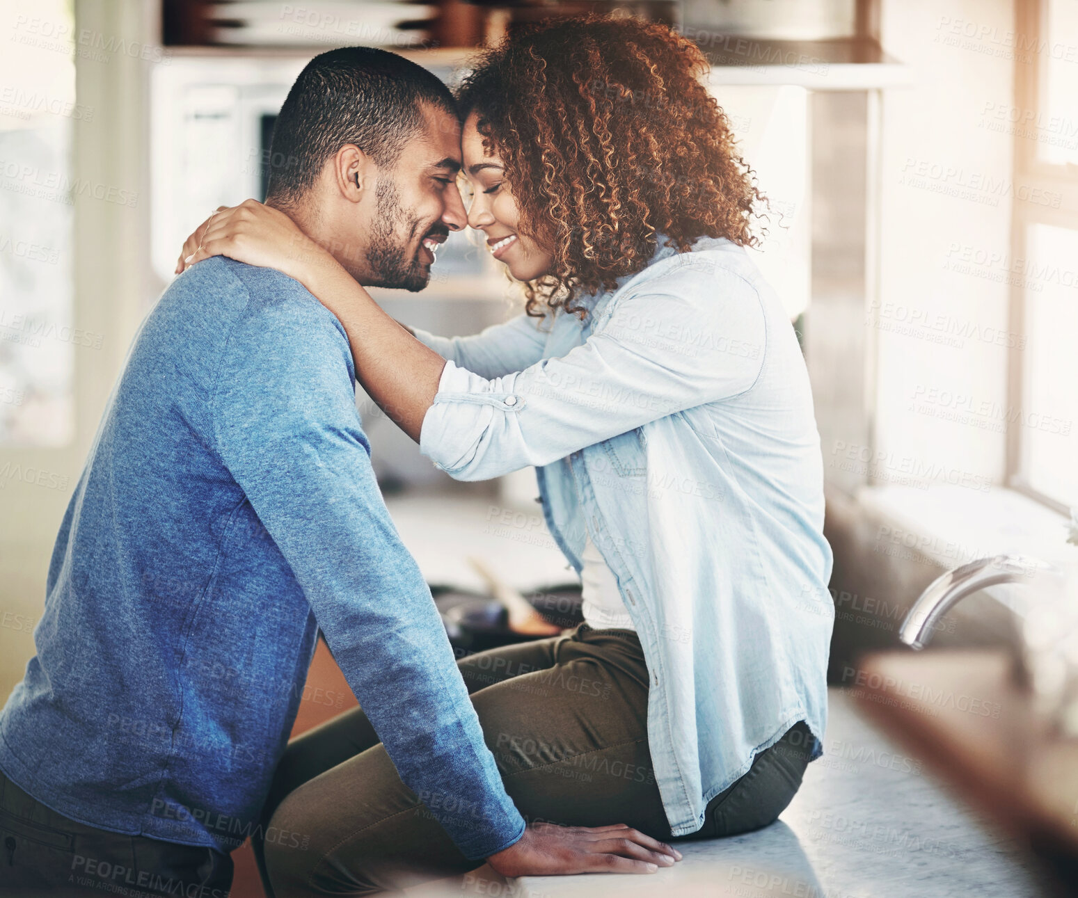 Buy stock photo Happy couple, hug and kitchen counter in home for morning relax or embrace, romantic or connection. Man, woman and bonding together in apartment for marriage love or wife smile, caring or support