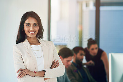 Buy stock photo Indian woman, business and portrait with arms crossed in office with colleagues, professional or computer. Female person, face and tech startup as website software or game design, confidence or smile