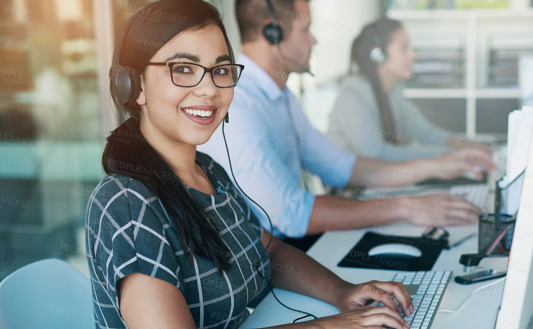 Buy stock photo Call center, telemarketing and woman portrait at computer with customer service and crm. Conversation, smile and phone consultant at coworking office with headset and operator with web advice at desk