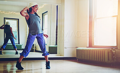 Buy stock photo Art, dance and studio with hip hop black woman at mirror for practice, recital or rehearsal. Creative, energy and fitness with happy dancer in class for expression, performance or dancing workshop