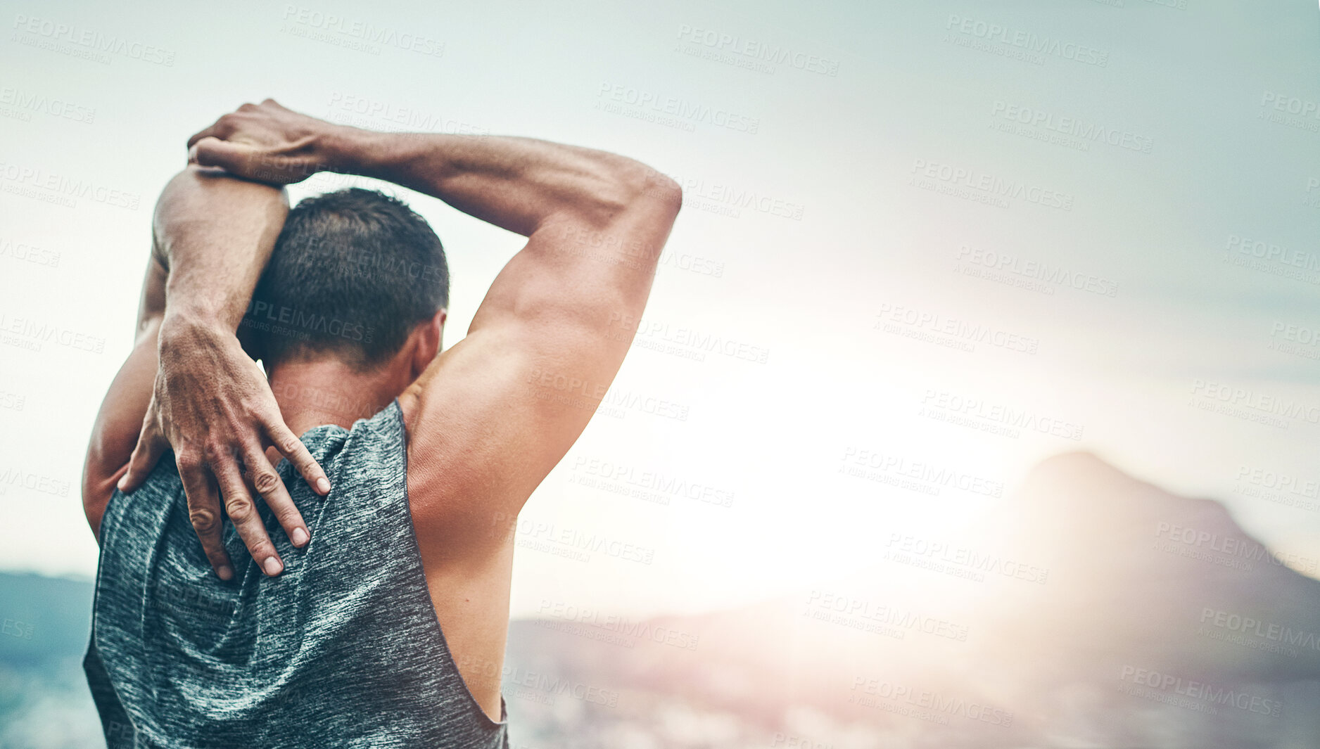 Buy stock photo Man, training and runner stretching arms in morning for benefits to health, wellness and energy. Athlete, prepare and back of workout for resilience in summer challenge with progress in fitness