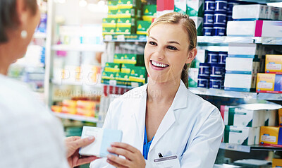Buy stock photo Pharmacist, shop and giving customer medicine, pills or drugs in box for healthcare and service. Happy, pharmacy and woman in store with sale, offer or shopping for supplements at drugstore or choice