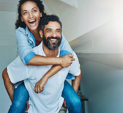 Buy stock photo Excited, couple and piggyback in new home with love of property or support in finance for real estate. Mortgage, loan and people together in house or apartment to rent and moving with happinessd