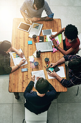 Buy stock photo Business people, discussion and documents in office for planning, subscription or company growth. Above, lens flare and diverse staff with paperwork for briefing, readership or graphs at publication