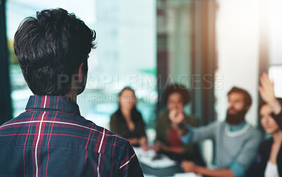 Buy stock photo Presentation, questions and back of man in office for training, workshop and company development. Business people, meeting and teaching in seminar for sales planning, kpi management and coaching