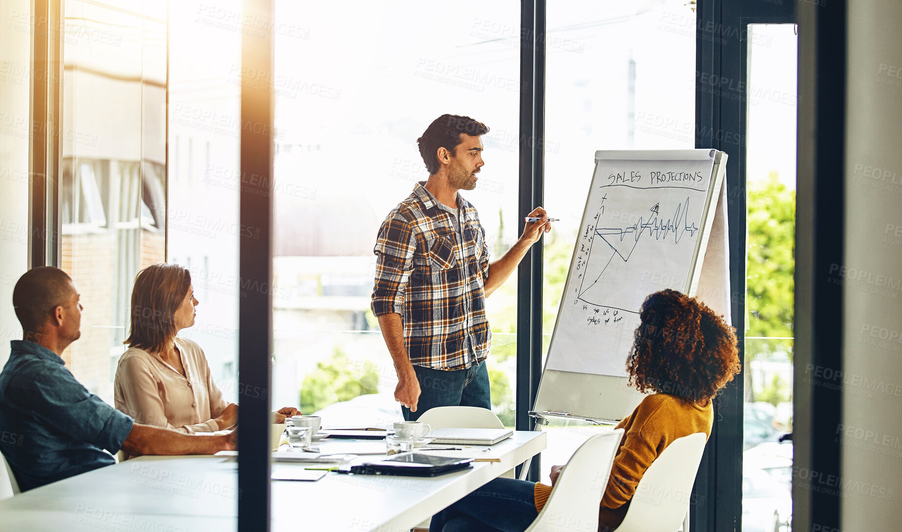 Buy stock photo Meeting, seminar and whiteboard with business man speaking to staff in boardroom of office. Coaching, presentation and training with employee talking to team in workplace for development or growth