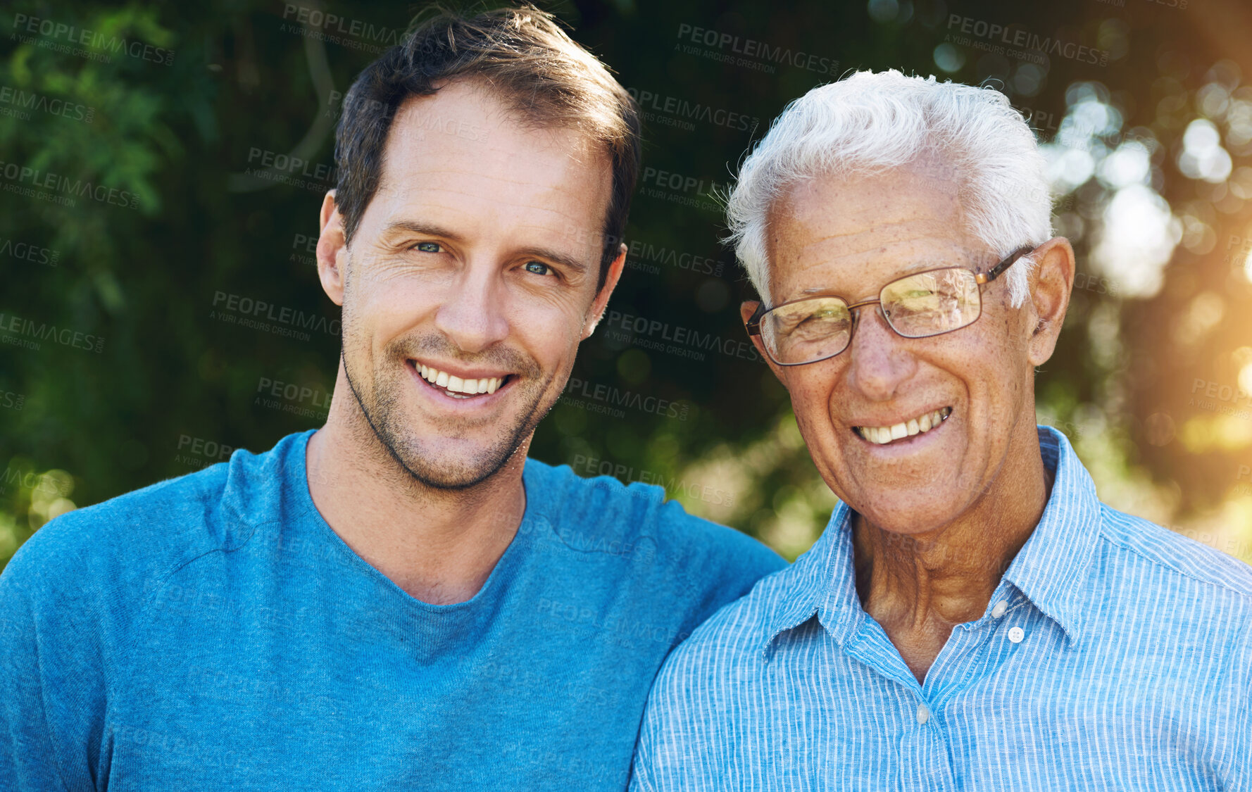 Buy stock photo Happy man and senior father in portrait together outdoor for love embrace on holiday or retirement. Family, granpa and male person with smile for bonding, care and support for elderly father 