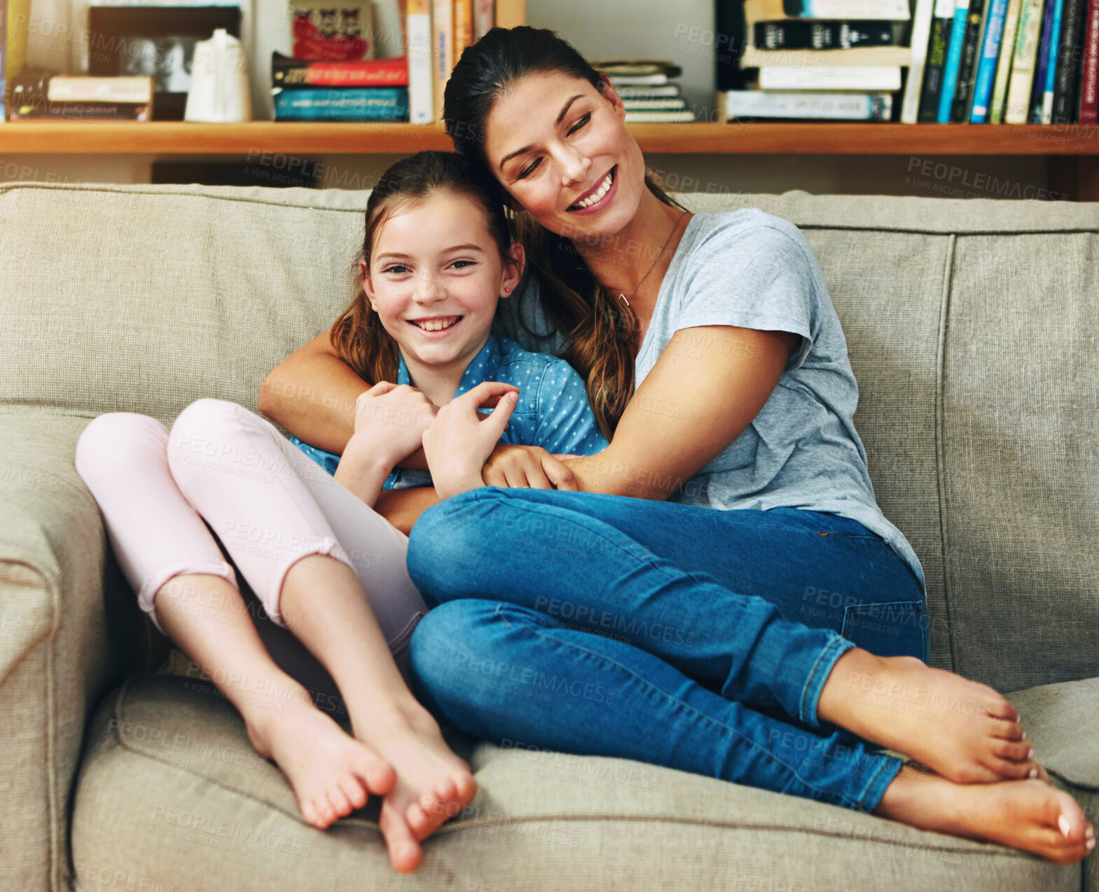 Buy stock photo Happy family, woman and daughter in home with hug, affection and couch in bonding for memory as preteen. Cheerful mom, girl and cute for love, support and childhood development on mother's day