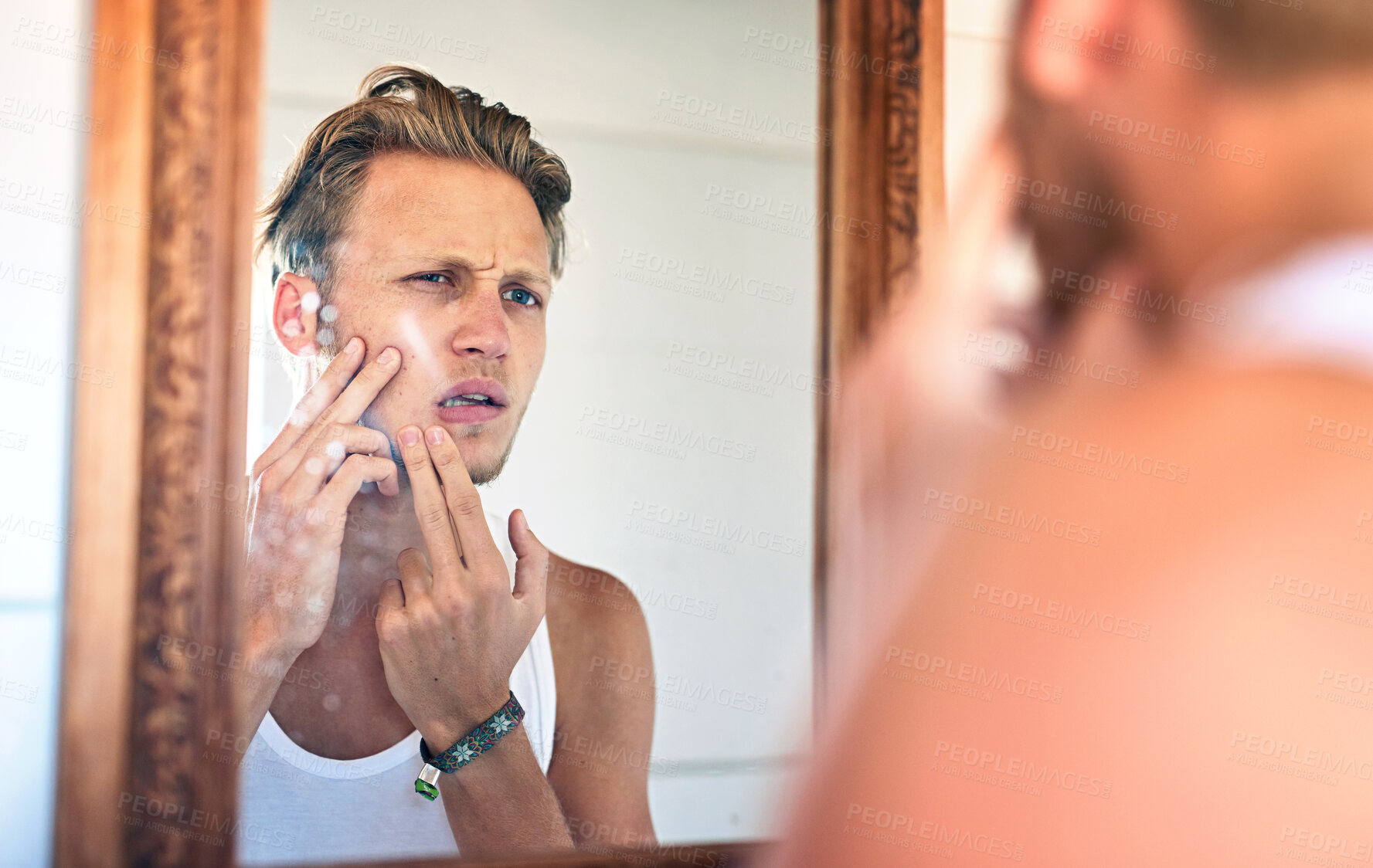 Buy stock photo Man, acne and skincare in mirror of bathroom with facial cleaning, grooming and confused with pimple. Personal hygiene, person and unhappy with breakout, blackhead scar and morning routine in home