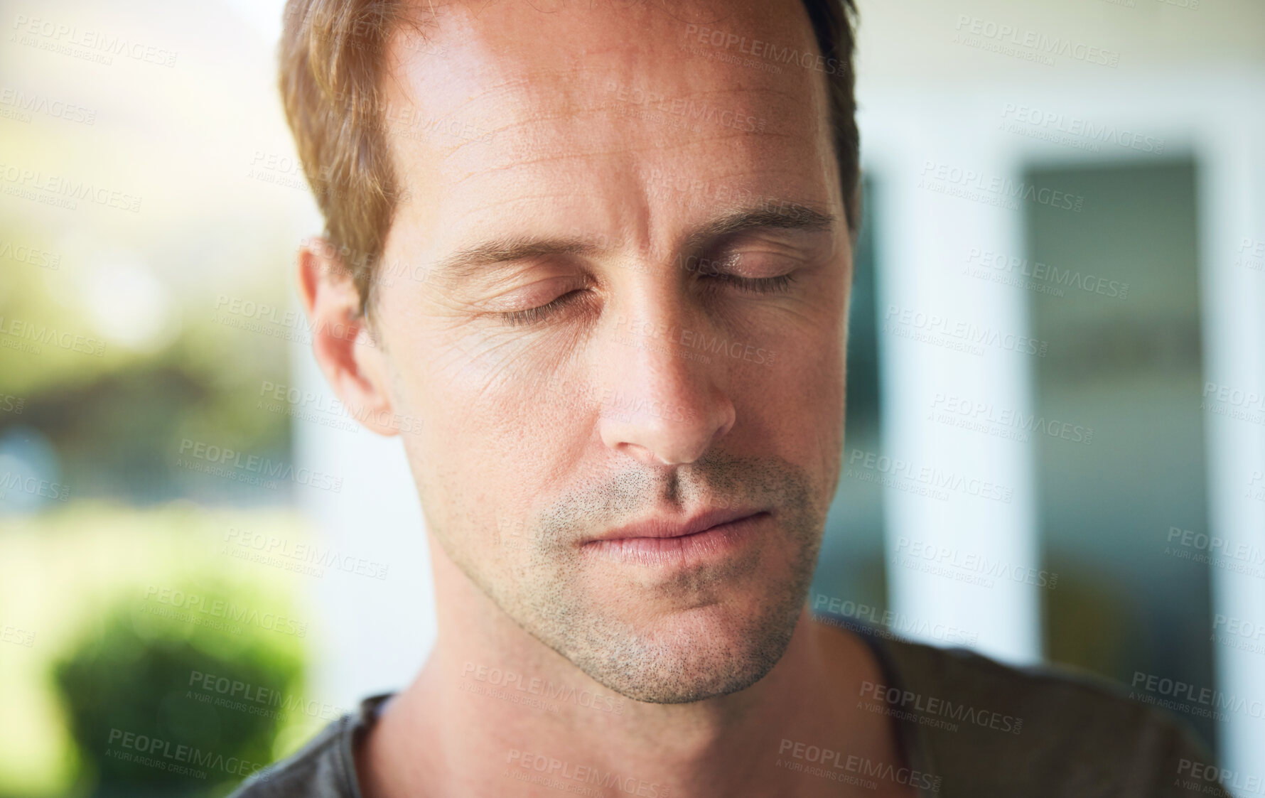 Buy stock photo Man, serious and eyes closed with relax outdoor for meditation, mindfulness and spiritual wellness in morning. Person, calm and zen with resting in home for fresh air, peaceful and mental health