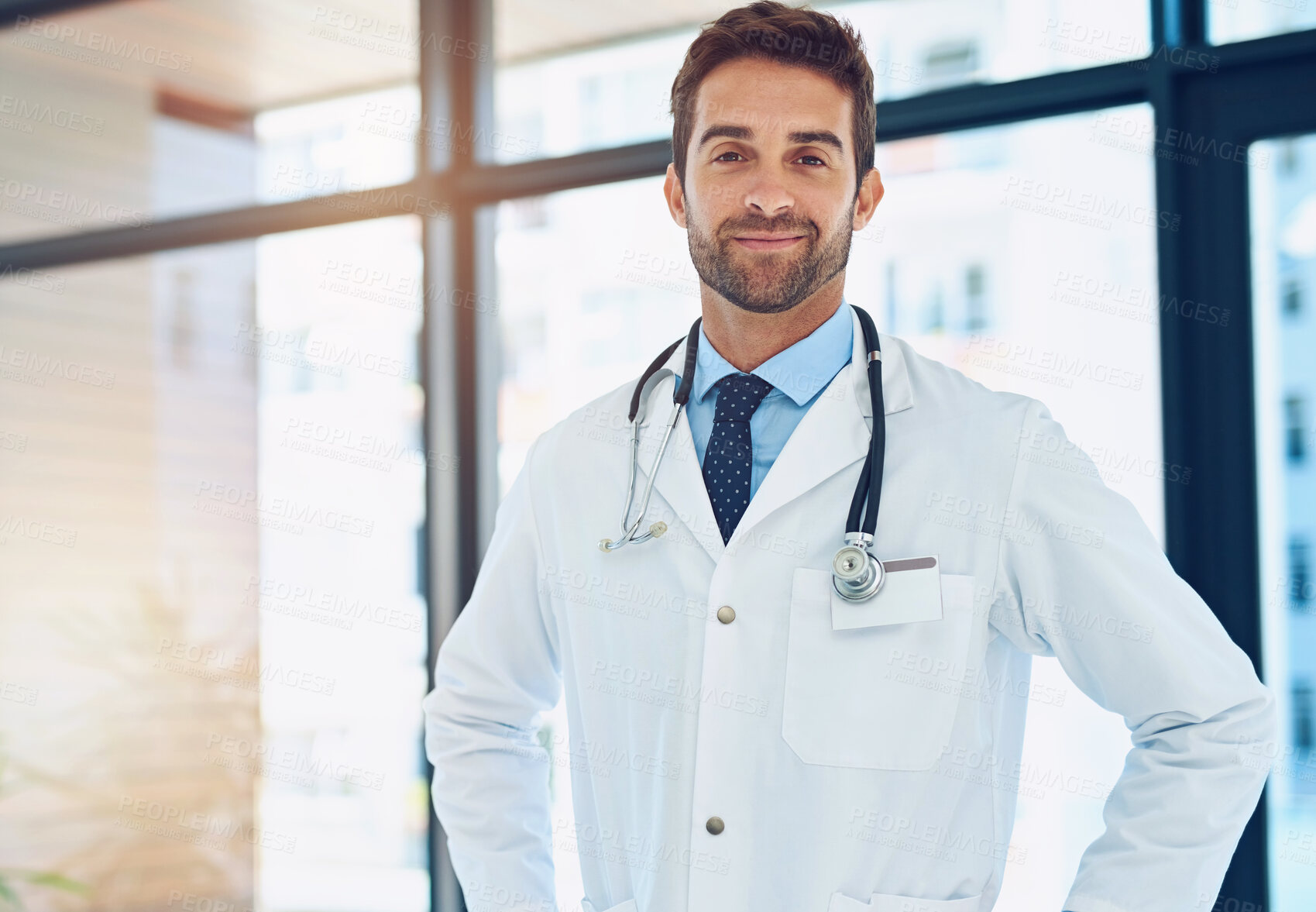 Buy stock photo Portrait, man and confident doctor in hospital for healthcare service, career or medicine in Italy. Face, medical professional and expert surgeon, employee and physician working at wellness clinic