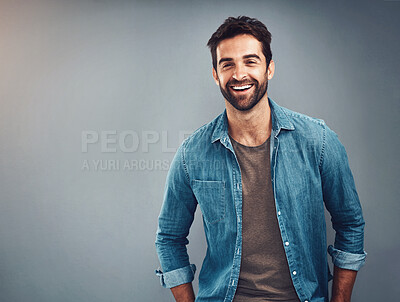 Buy stock photo Fashion, mockup and smile with portrait of man in studio on gray background for relaxed clothing style. Casual, happy and space with natural person in clothes outfit to model jacket or wardrobe