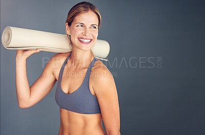 Buy stock photo Fitness, exercise and woman with yoga mat, smile and confident girl on grey studio background. Thinking, person and model with challenge, progress and training for wellness, healthy and mockup space