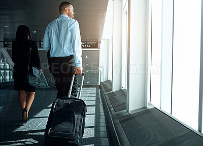 Buy stock photo Travel, suitcase or luggage with business man in airport walking to gate for international trip or adventure. Corporate journey, male person or entrepreneur departure for global opportunity back view