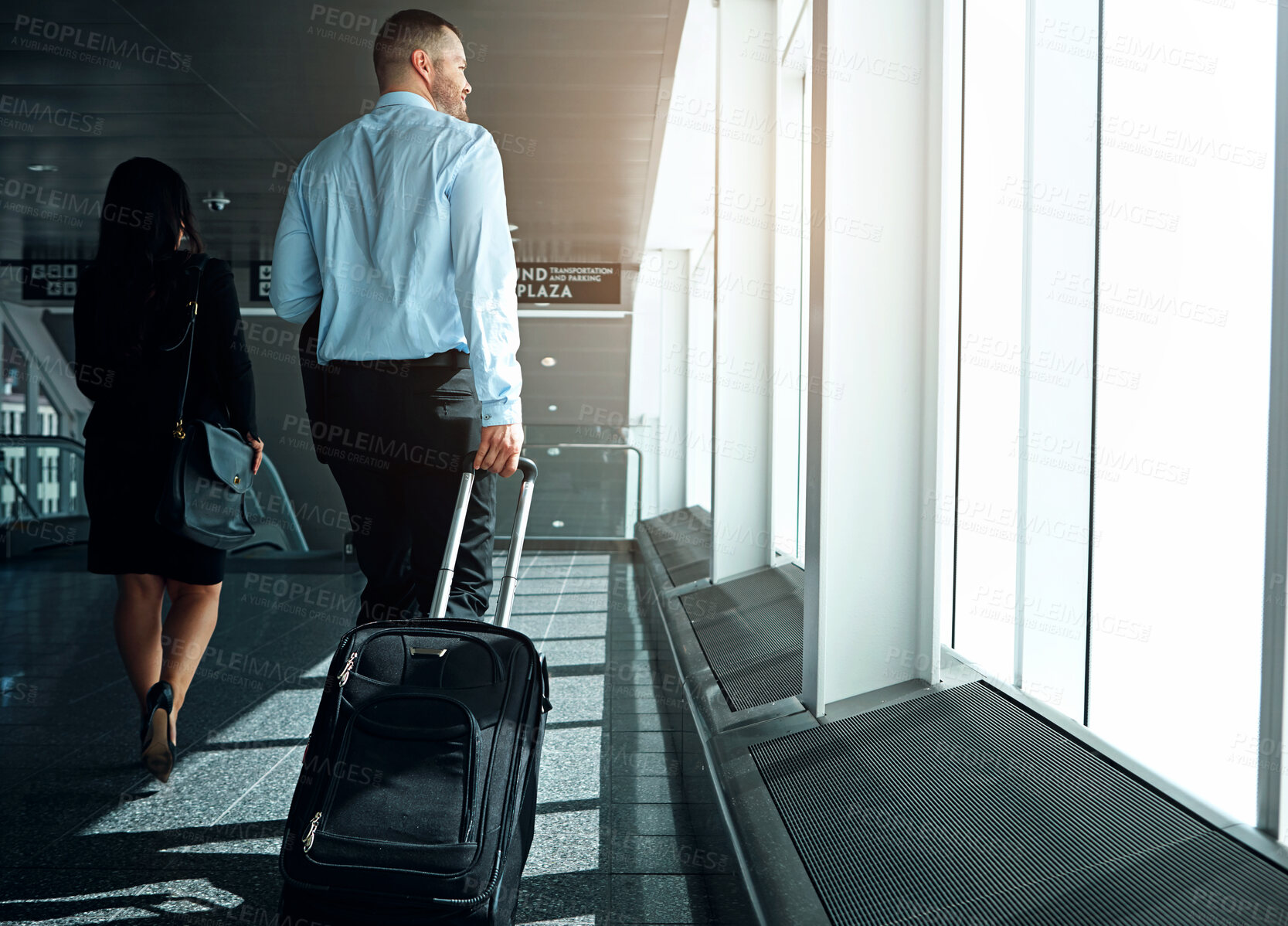 Buy stock photo Travel, suitcase or luggage with business man in airport walking to gate for international trip or adventure. Corporate journey, male person or entrepreneur departure for global opportunity back view