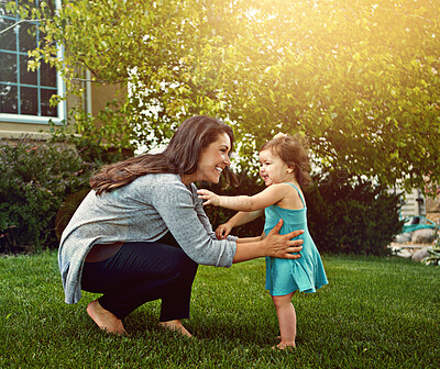 Buy stock photo Smile, woman and baby with love in garden for outdoor fun, care and support in child development. Family, toddler girl and mom with happiness in backyard for growth, bonding and motherhood on weekend