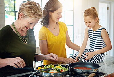 Buy stock photo Grandmother, love or cooking by girl with mother in kitchen for learning, care or bonding at home. Family, generations or grandma teaching kid traditional food, recipe or meal, nutrition and balance