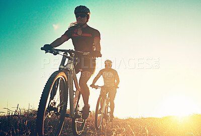 Buy stock photo Fitness, sunrise and people with bicycle in morning for training, workout and exercise in countryside. Sports, cycling and friends on mountain bike for adventure, travel and adrenaline on dirt road