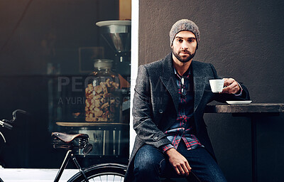 Buy stock photo Coffee break, man and cafe with bicycle portrait and morning commute at table in urban restaurant. Serious, diner and relax with sustainable and eco friendly travel in a shop with hot drink and bike