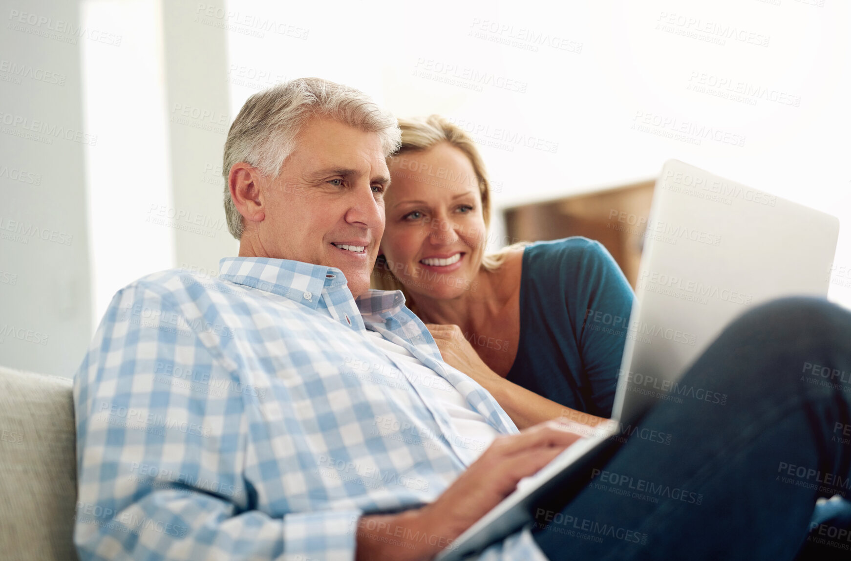 Buy stock photo Couple, people and home with laptop on sofa with internet for online or digital application for loan. Email, smile and happy on couch with good news or approval for house finance, mortgage and funds