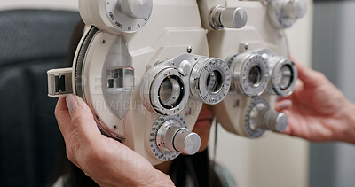 Phoropter, eye test and optometrist for vision, medical practice for optical exam or consultation. Optometry, technology and analysis machine, female patient at professional ophthalmologist clinic