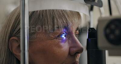 Buy stock photo Patient, slit lamp or ophthalmology as eye test, medicine or optometry as healthcare technology. Mature woman, eyeball or light in glaucoma, exam or consultation to diagnose lens, cornea or myopia