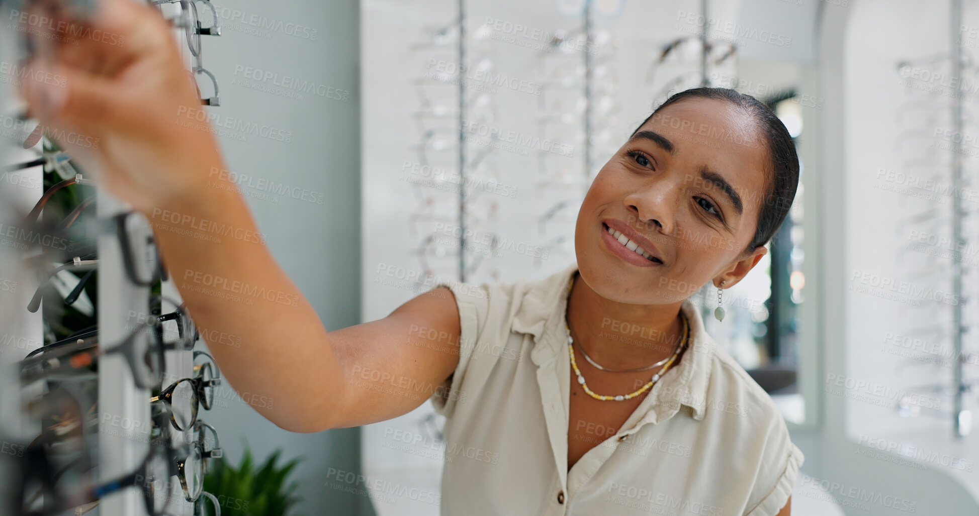 Buy stock photo Woman, glasses or choice in vision, optometrist or retail as customer, thinking or search for stock. Optician, sales assistant or eyewear as happy, decision or idea of inventory in specialist service