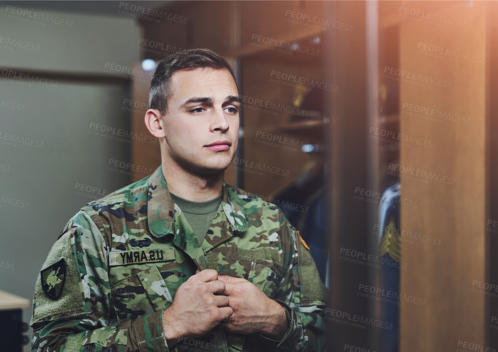 Buy stock photo Man, army and soldier in home, uniform and duty for pride, respect and country in ready for deployment. Male person, war and hero in barracks with service, camouflage and mirror as recruit or patriot