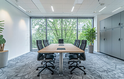 Empty, table and chairs for conference room, corporate company and meeting boardroom in law firm building. Vacant, furniture and seats for luxury office or workplace, interior and clean modern design