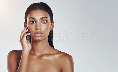 Buy stock photo Beauty, studio and portrait of Indian woman with skincare from dermatology in mockup space. Face, makeup and girl with confidence from healthy facial or pride from cosmetics in white background