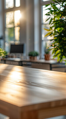 Business, blur and empty office with plants, desk and creative workplace with recruitment opportunity. Building, interior design and sustainability with wood, table and professional startup space.