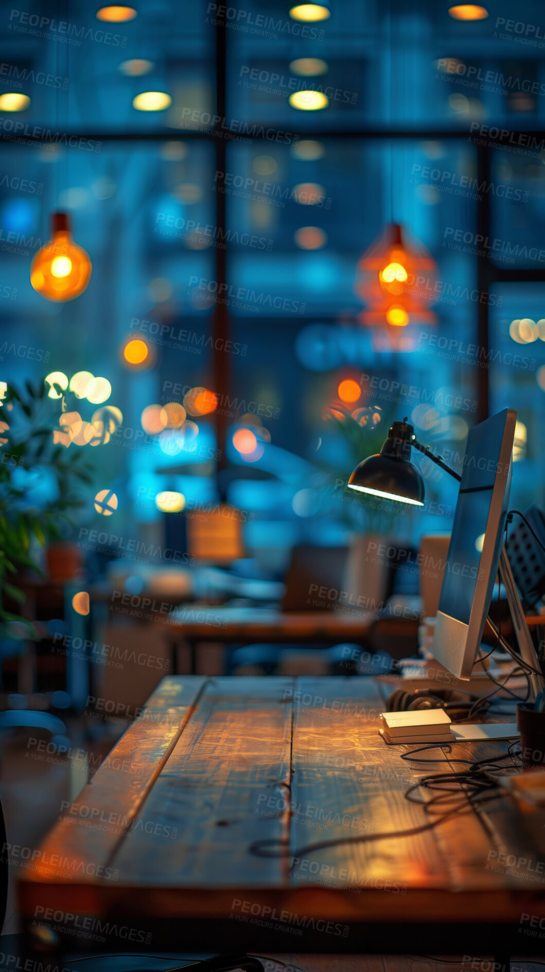 Buy stock photo Office, window and empty with computer in workstation for call center business at night. Notes, headset and lamp with internet or technology alone on table with wires, plants and desk in London.