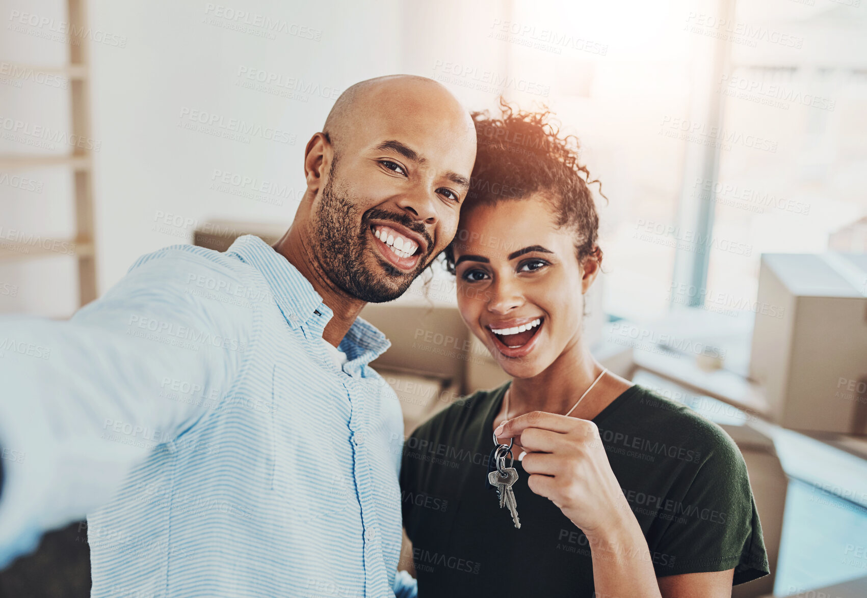 Buy stock photo African man, woman and keys in new home with smile, portrait and excited for fresh start with property. Couple, happy and moving with boxes in apartment, real estate and investment with mortgage